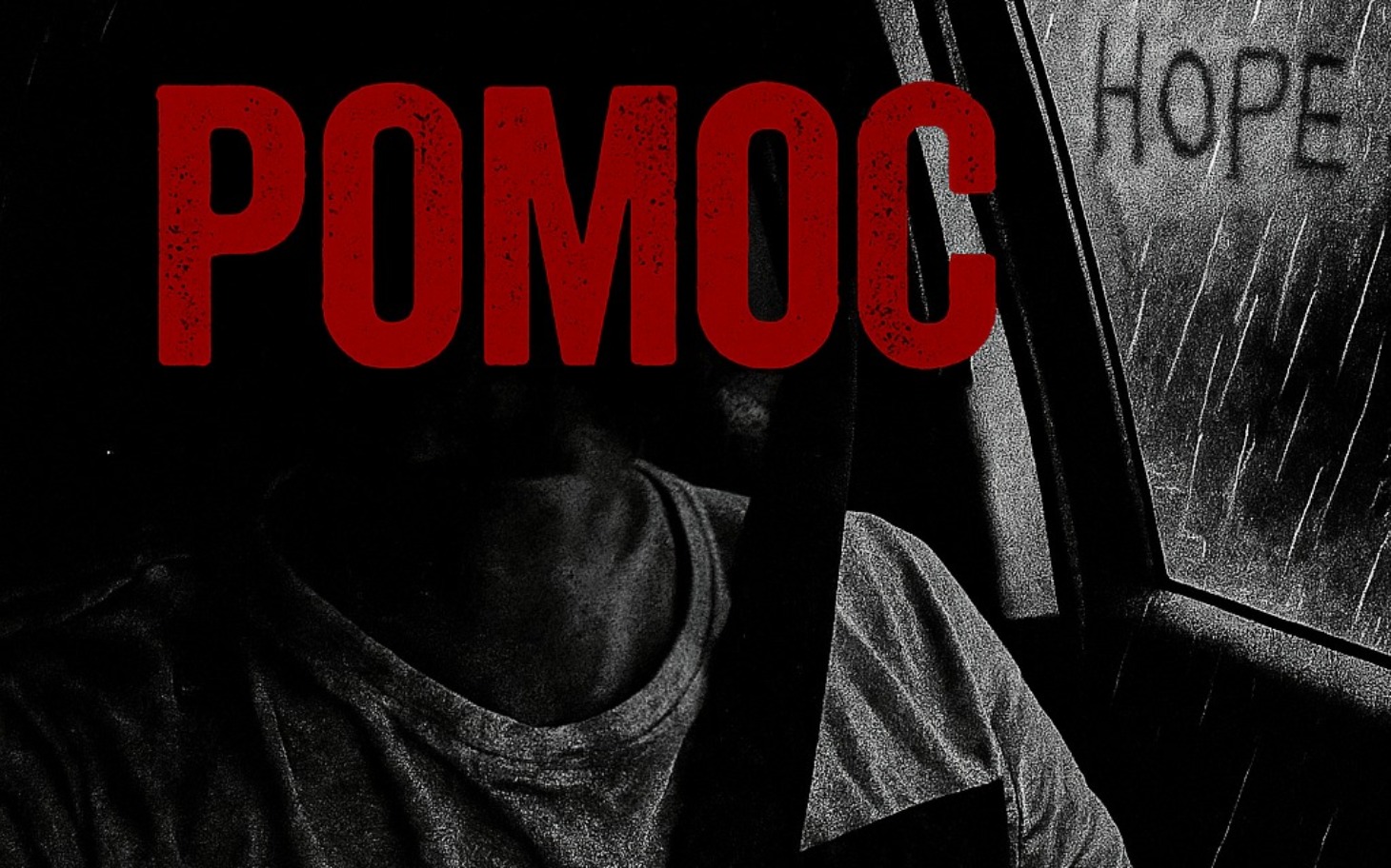 
        Człowiek w samochodzie, z napisem 'POMOC' na tle deszczu.
    