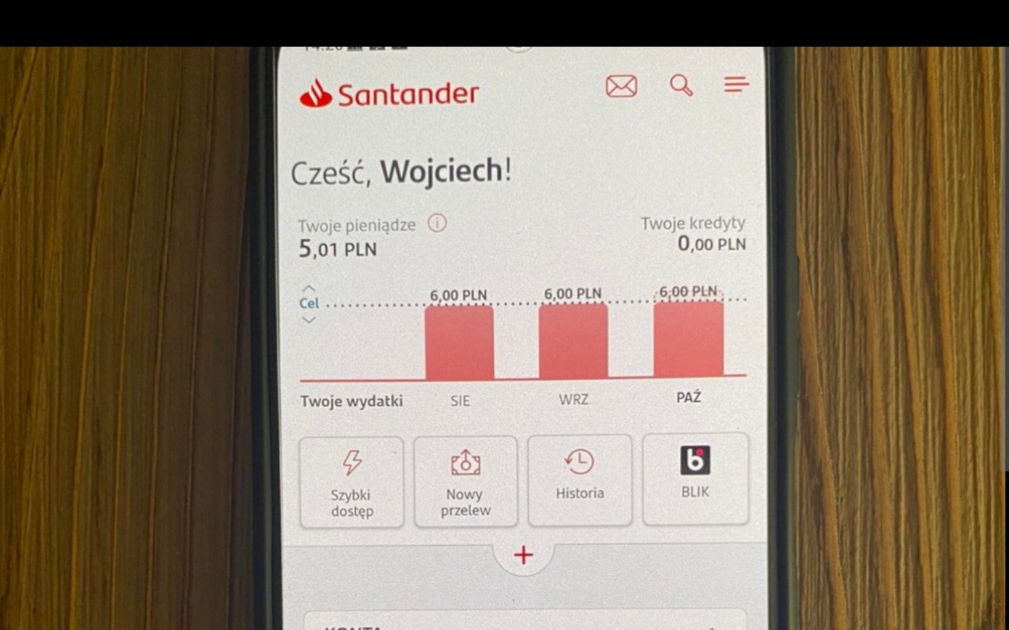 
        Zrzut ekranu aplikacji bankowej z informacjami o wydatkach.
    