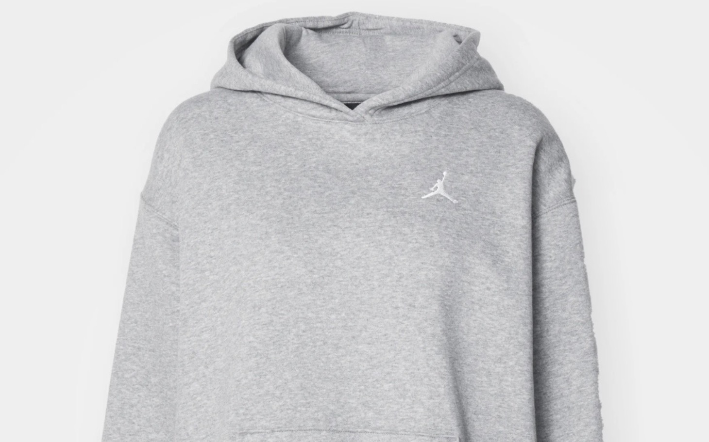
        Szara bluza z kapturem z logo Jordan.
    
