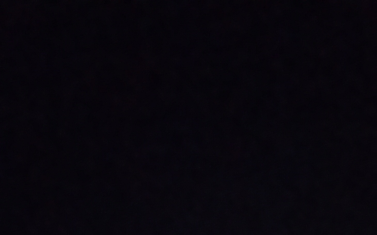 
        Ciemny obraz, prawdopodobnie przedstawiający nocne niebo.
    