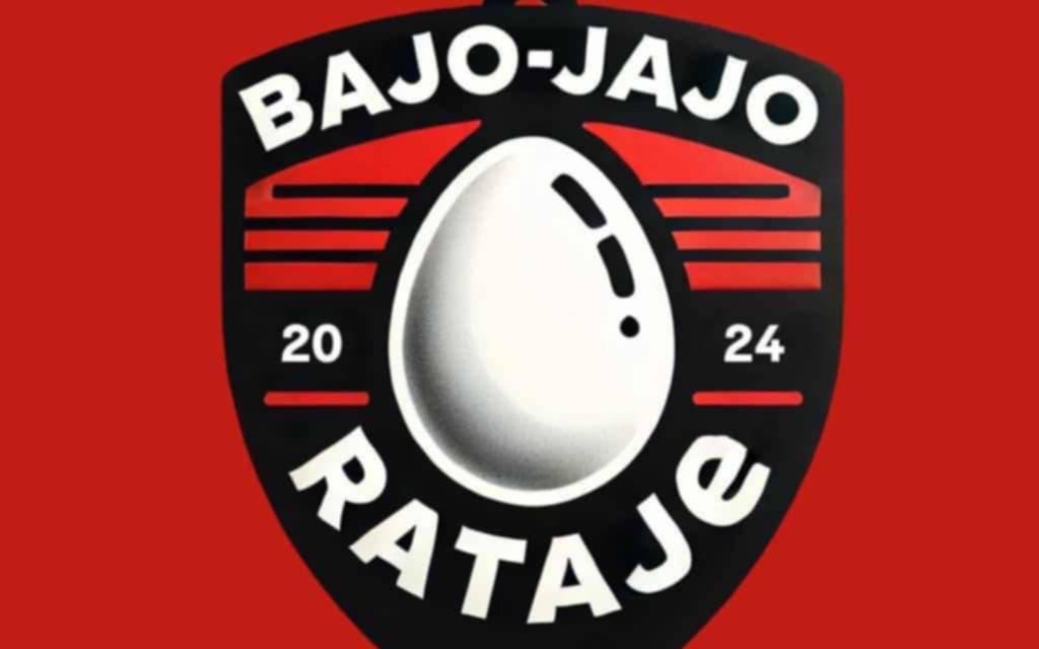
        Logo drużyny sportowej Bajo-Jajo Rataje na czerwonym tle.
    