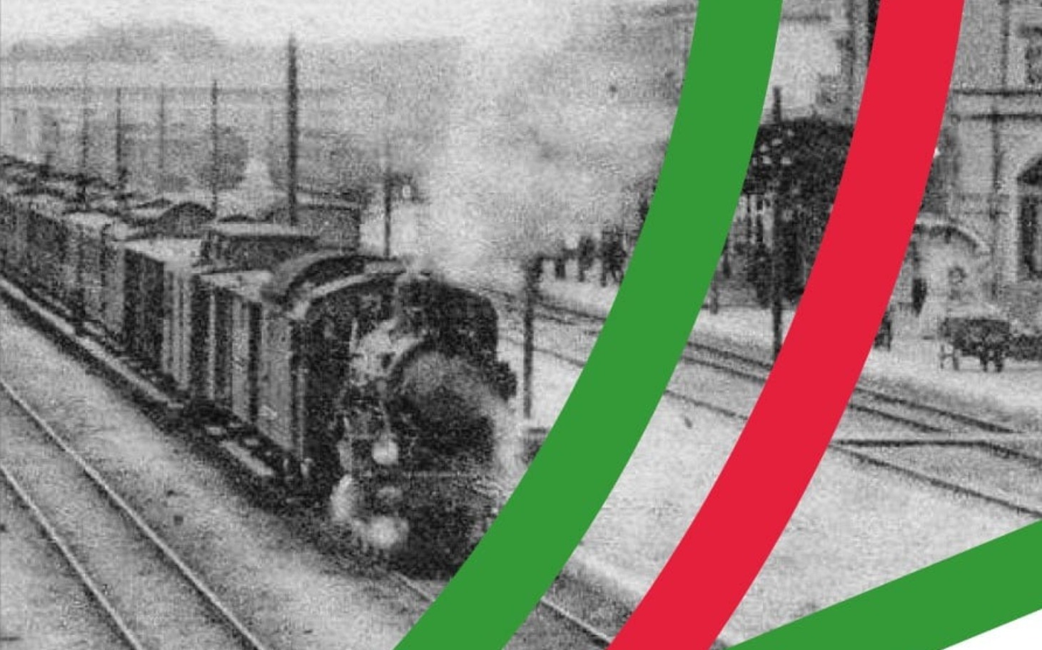 
        Stara fotografia parowozu na stacji kolejowej, z dymem unoszącym się w powietrzu.
    