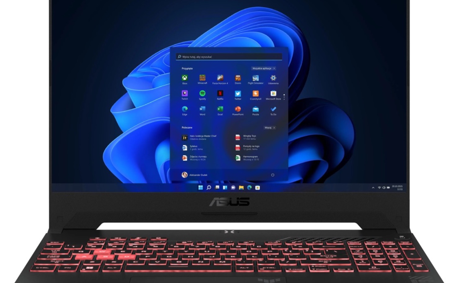 
        Laptop z systemem Windows 11, wyświetlający pulpit.
    