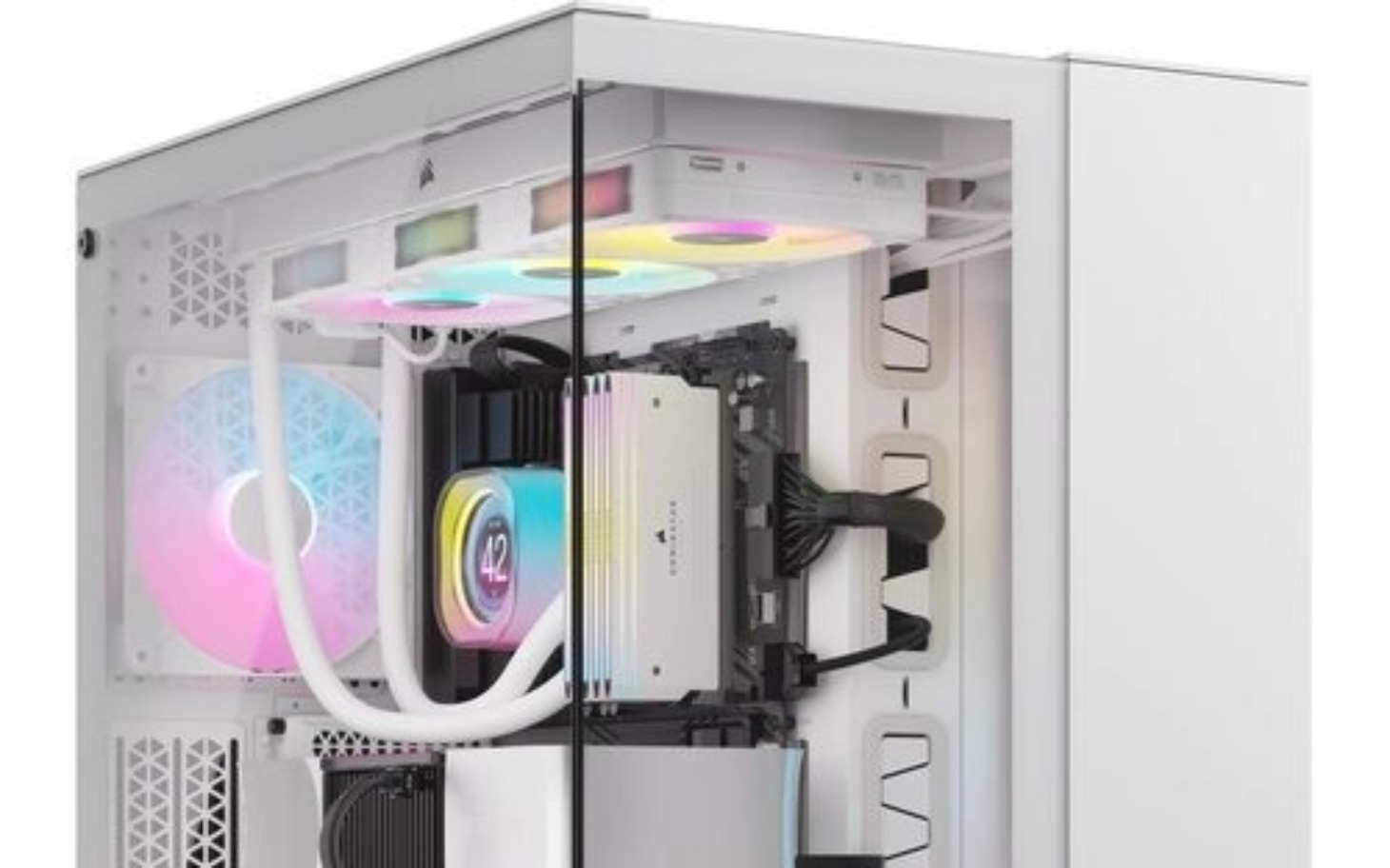 
        Wnętrze komputera z kolorowymi wentylatorami.
    