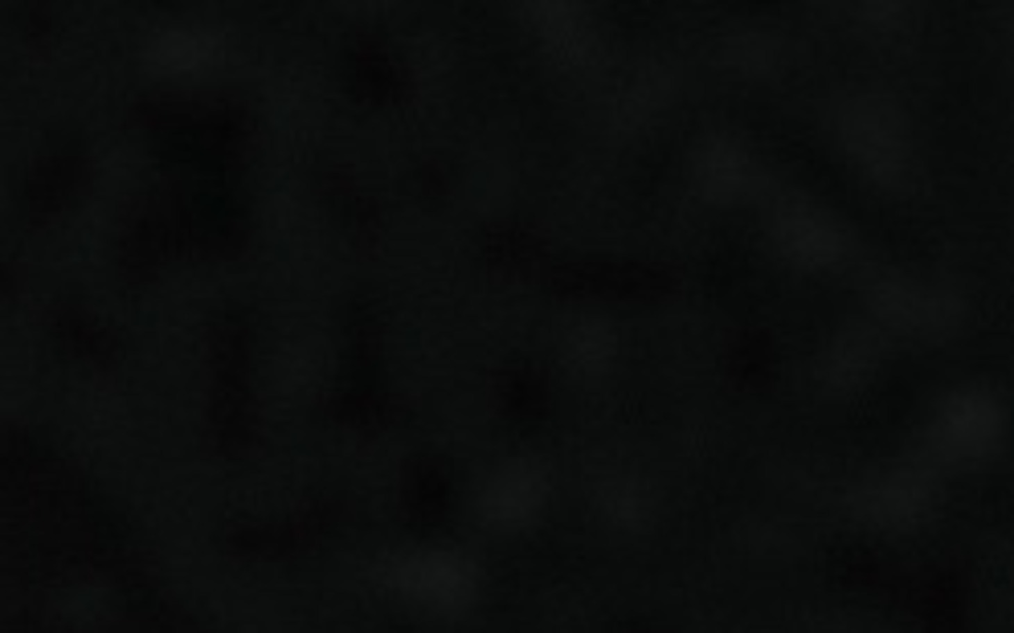 
        Ciemne tło, tekstura w odcieniach czerni.
    