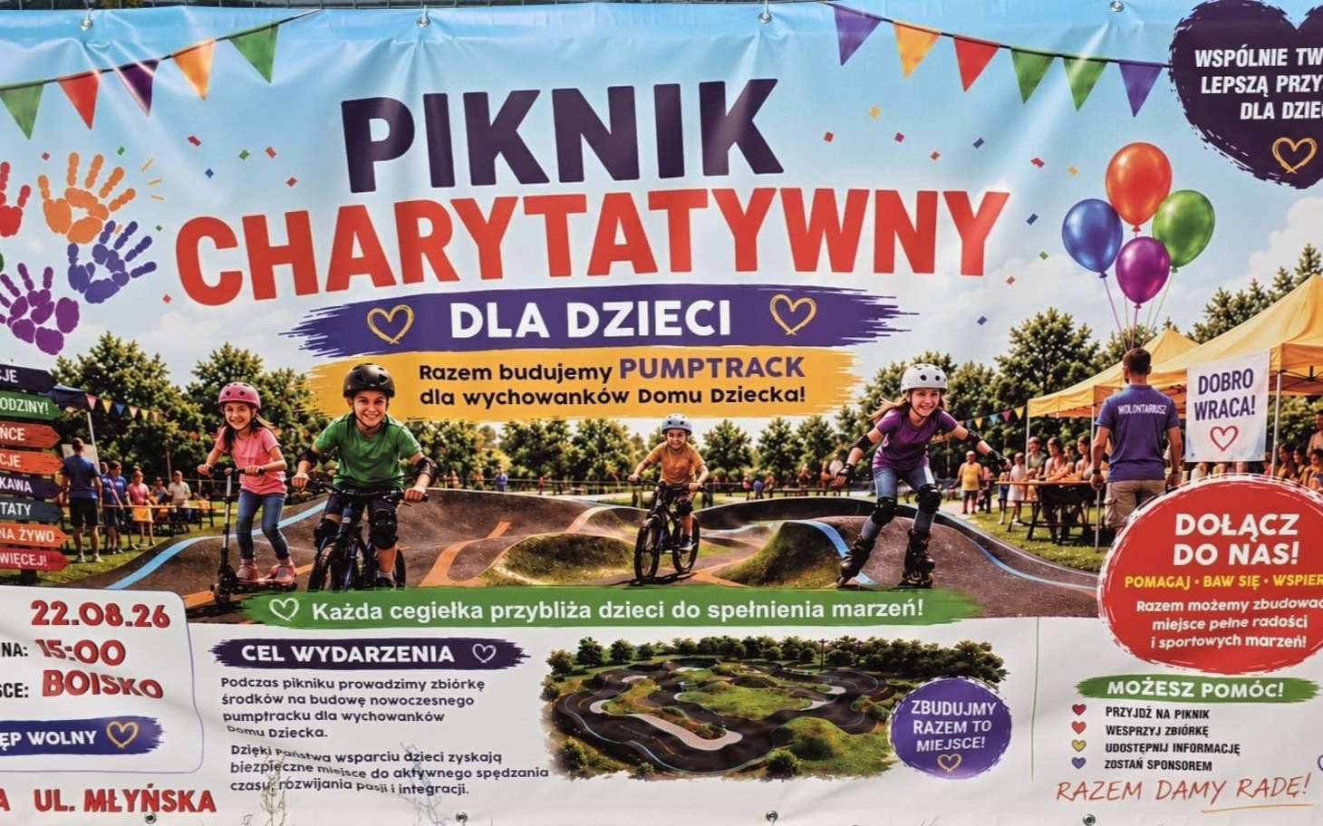 
        Banner Piknik Charytatywny dla dzieci z kolorowymi balonami.
    